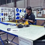Corrugated box manufacturing team using Flexpipe modular structures for lean workplace organisation