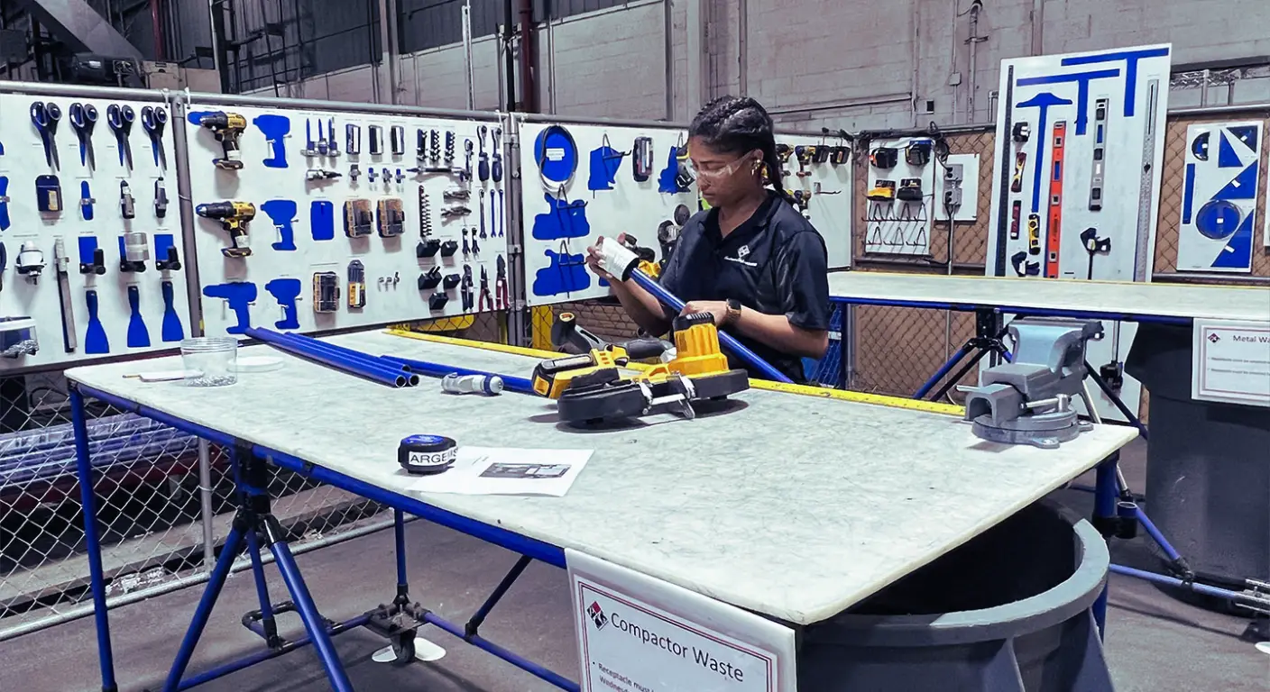 Corrugated box manufacturing team using Flexpipe modular structures for lean workplace organisation
