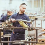 Australian manufacturing employees collaborating on lean manufacturing workplace improvements