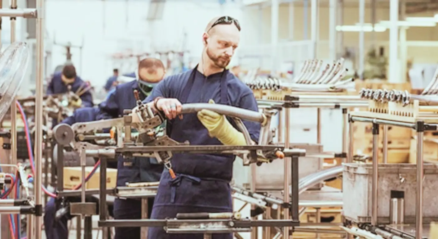 Australian manufacturing employees collaborating on lean manufacturing workplace improvements